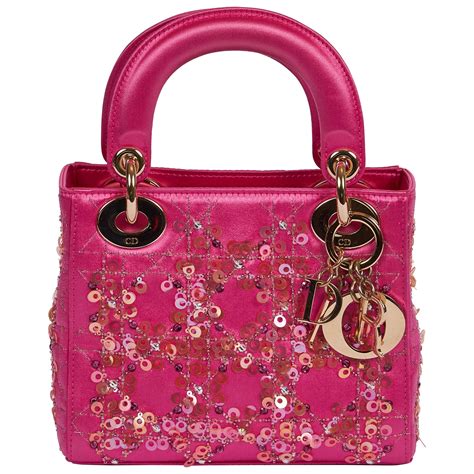 hot pink christian dior bag.